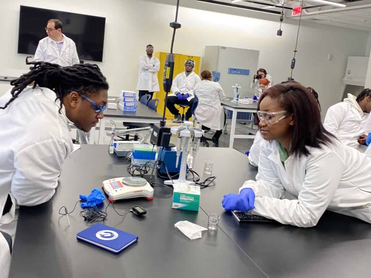 Learners enrolled in the first Biotech Career Foundations cohort study the industry-standard equipment available in the Bioversity lab