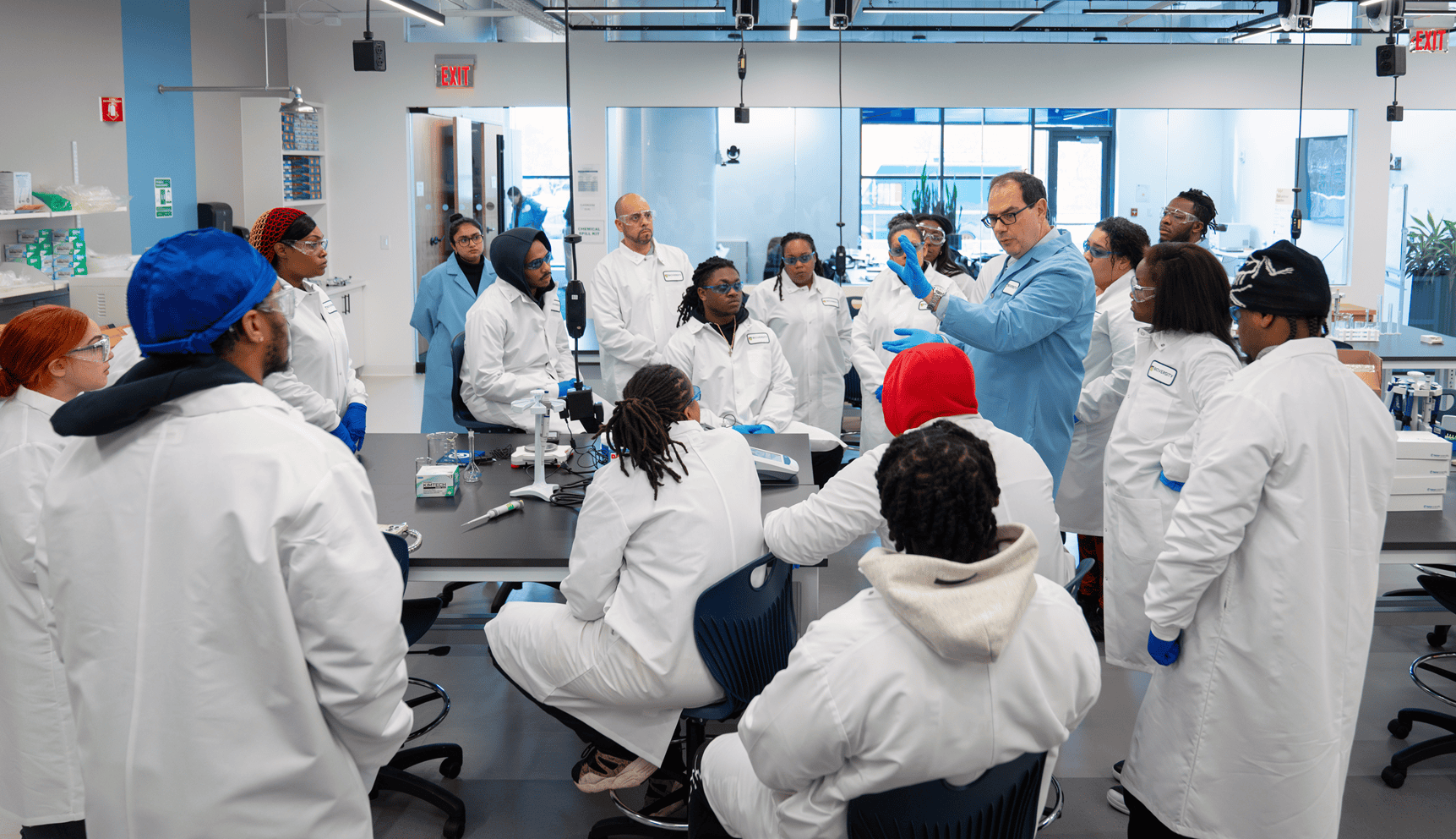 bioversity professor teaching students in lab