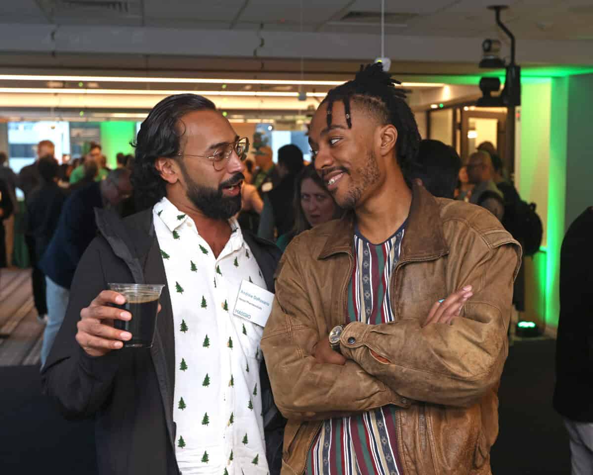 people smiling at st patricks day mixer